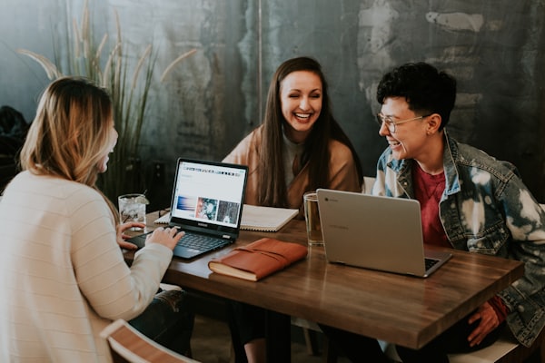 A brand team working around a table